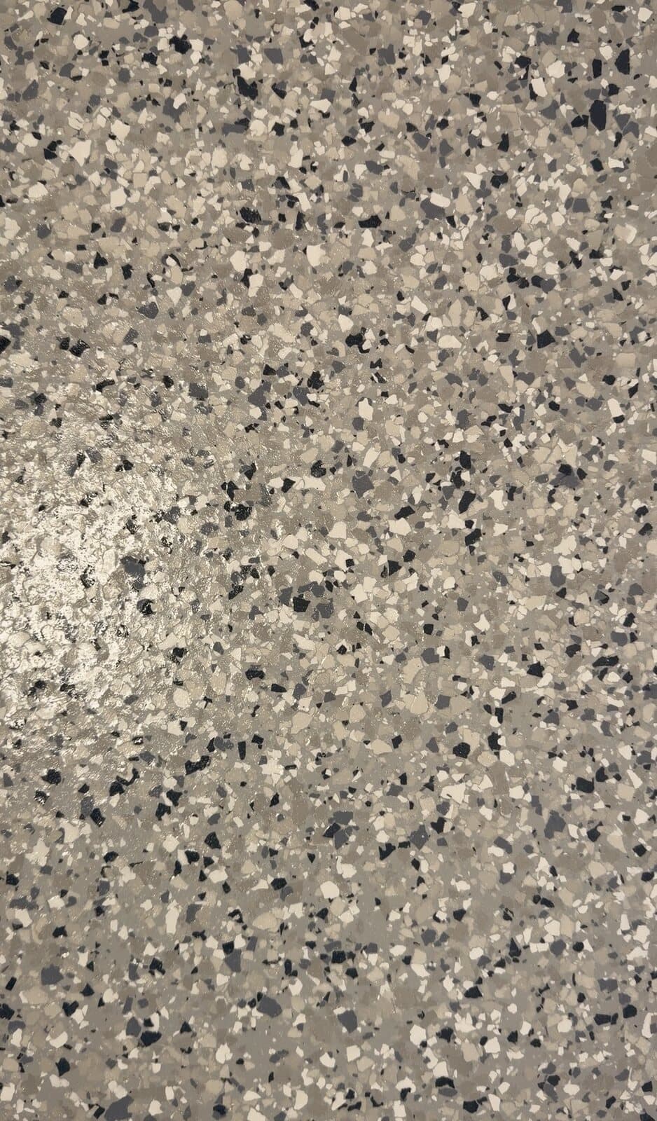 Close-up of the 1/4-inch Tidal Wave flake floor finish